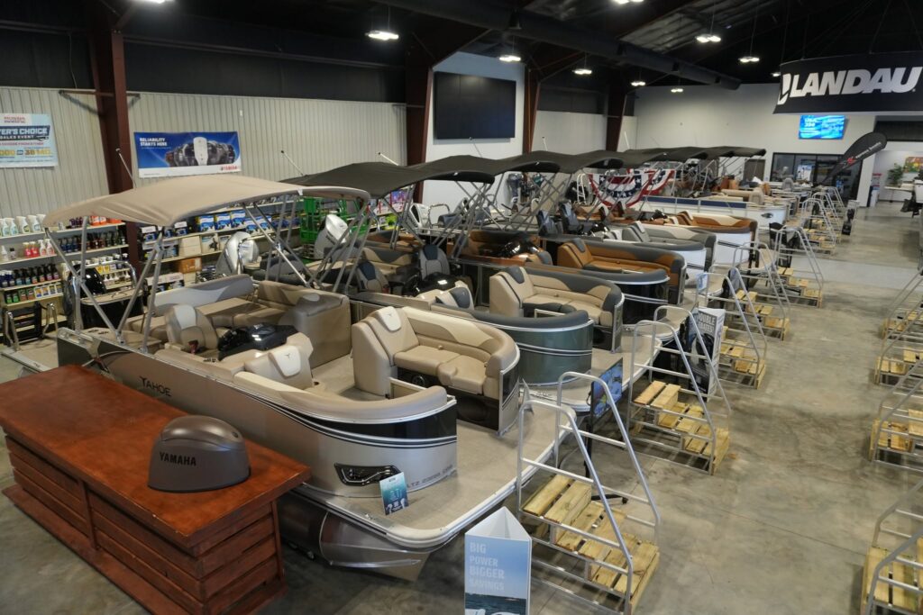 an interior shot of the Toons Eufaula dealership in Checotah Oklahoma featuring landau boats, tahoe pontoons, and various parts and accessories. 